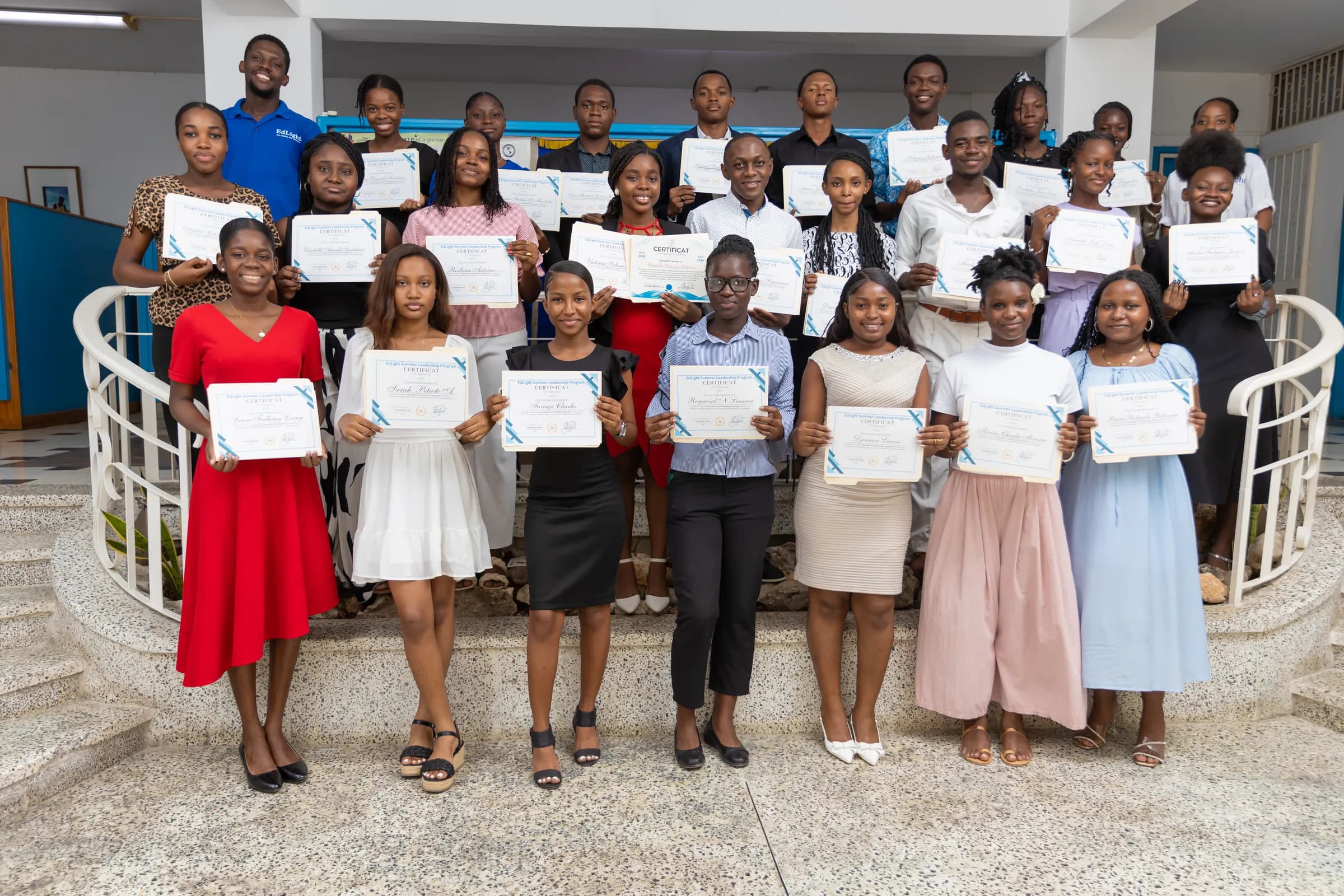 The 35 graduated fellows of ESLP 2026 holding their certificates at IICA in Pétion-Ville